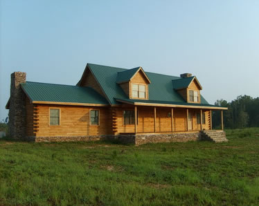 Example Of Successfully Installed Metal Roof on Log Cabin Style Home