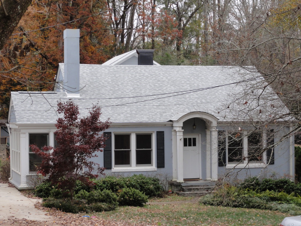 Example of asphalt singles on traditional style home